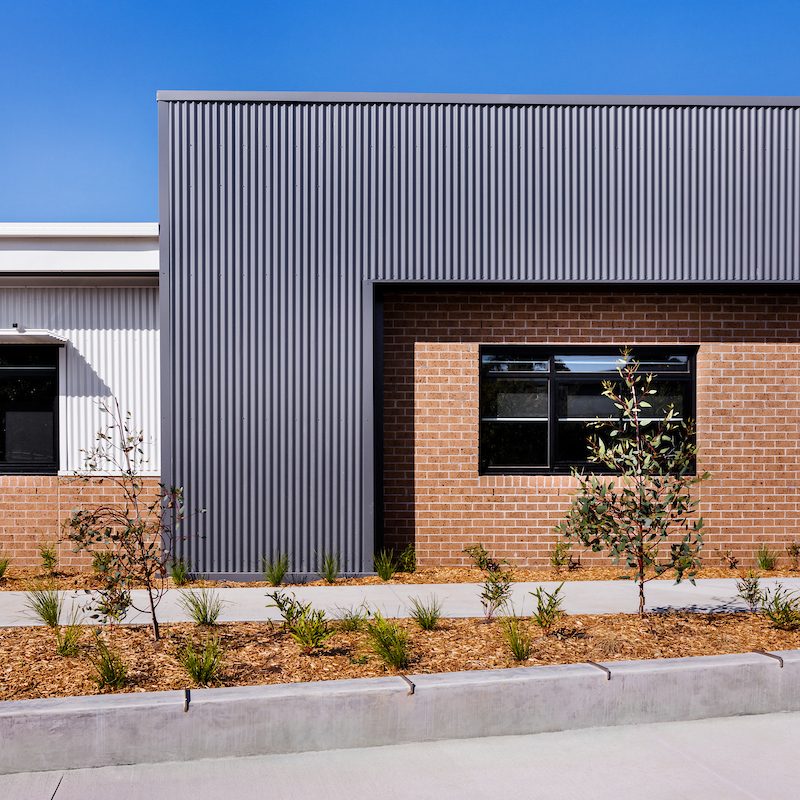 Brick and metal-clad building exterior
