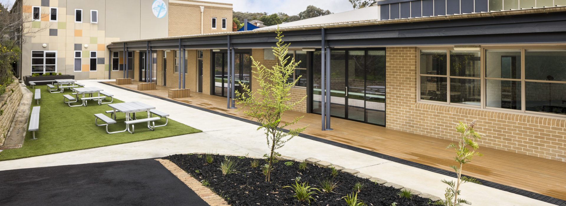School courtyard with outdoor seating