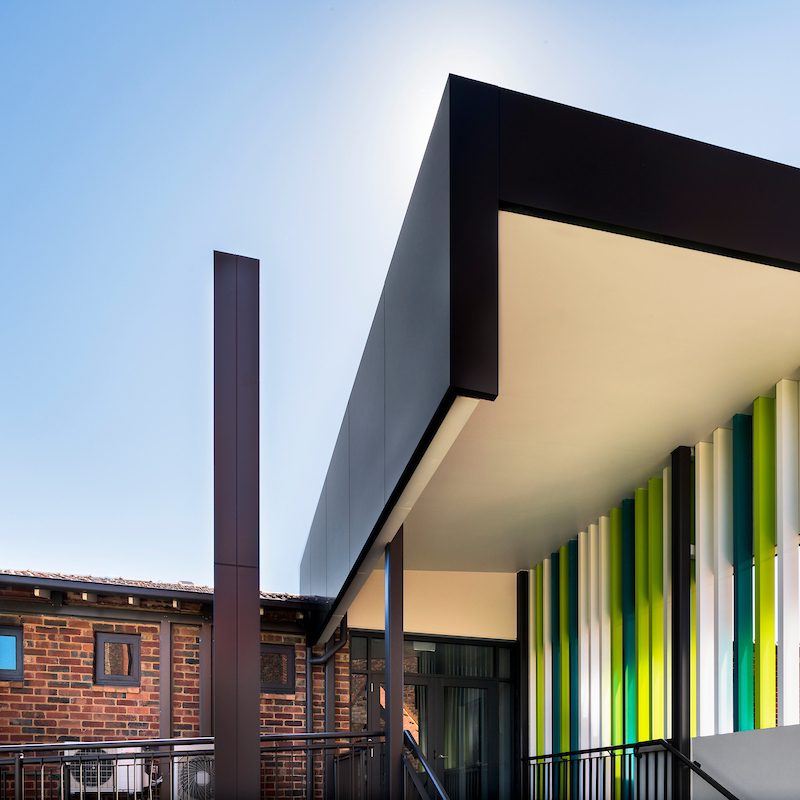 School building with coloured feature cladding